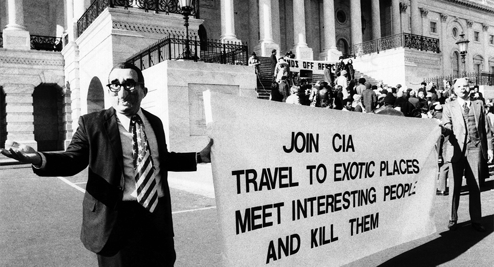 Demonstrators wearing Henry Kissinger and pig masks protest against US involvement in Angola  in front of the Capitol, 1976 (CSU Archives/Everett Collection Historical/Alamy)